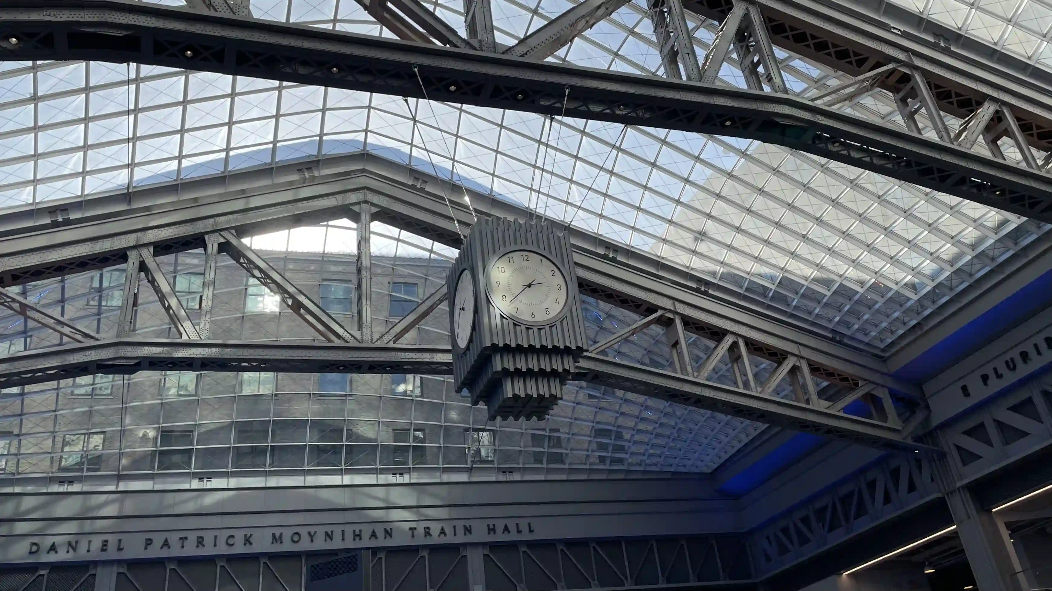 A photograph of the clock above Moynihan Train Hall in New York City.